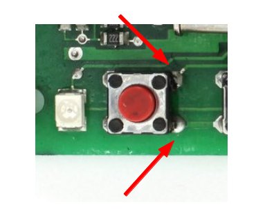 Button on circuit board closeup