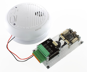 Smoke detector opened with soldered wires to LED connected to Industrial Digital In 4 Bricklet